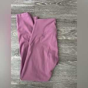 Purple Lululemon leggings. Size 6. Worn once. Wrinkles from storage